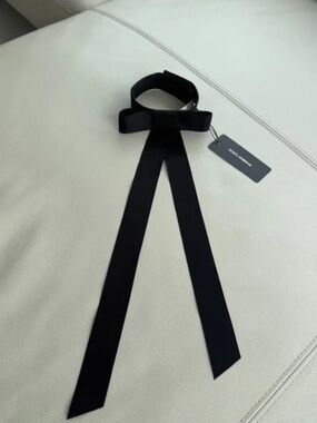 Dolce & Gabbana Stylish black satin choker with elegant bow. Adds sophistication